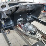 Gearbox and tunnel extension panel